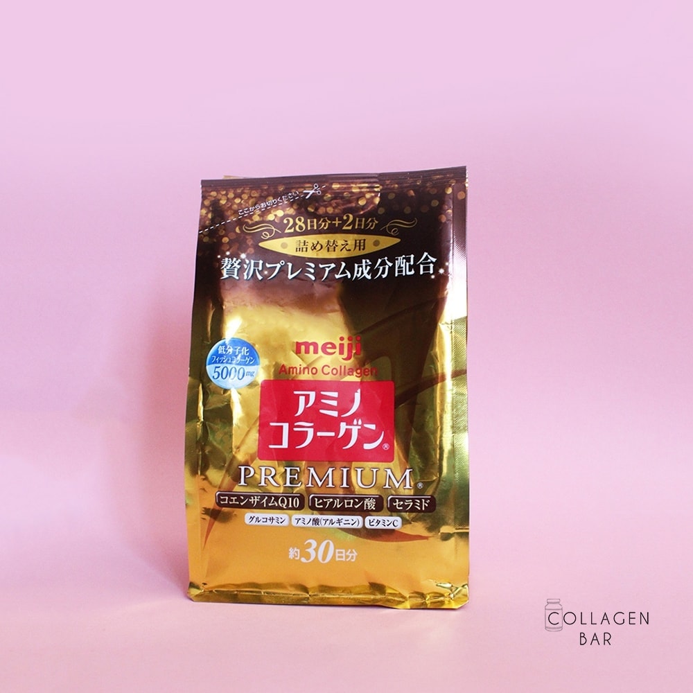 Колаген Meiji Amino PREMIUM у змінному пакеті на рожевому тлі