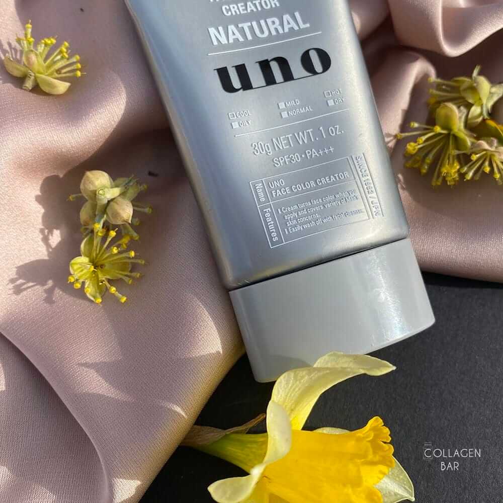 BB-крем SHISEIDO UNO Face Color Creator на коричневій тканині з жовтими квітками