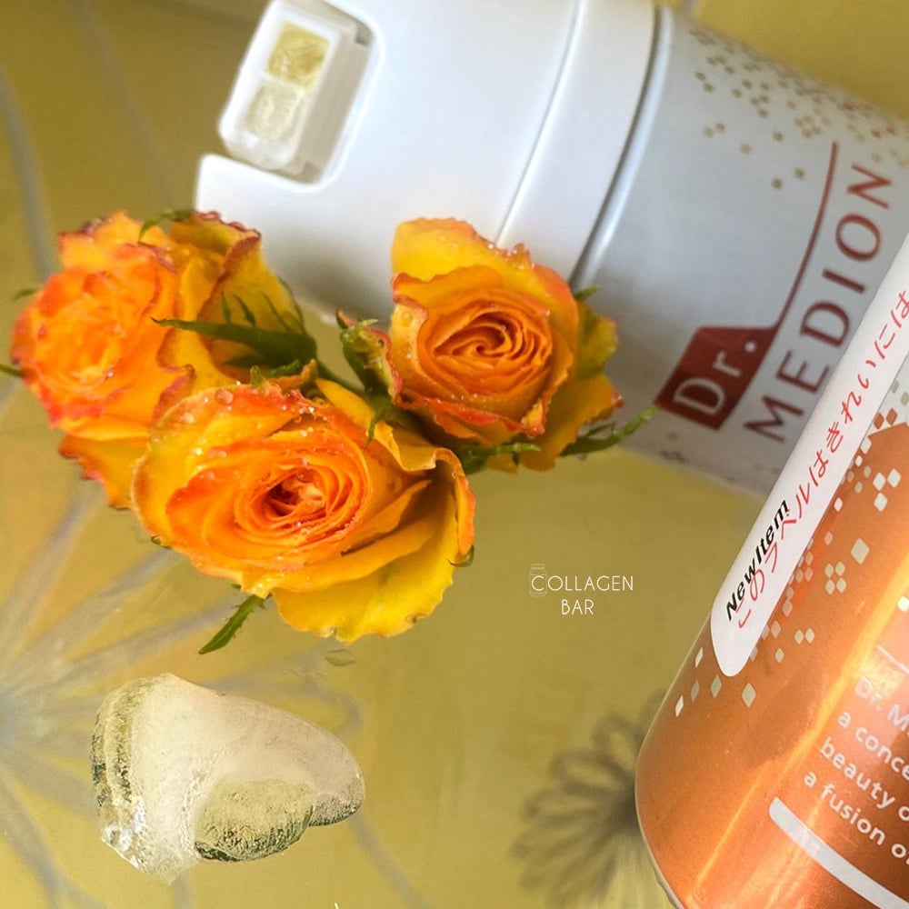 Дозатор карбокси маски Dr. MEDION Spa Oxy Dual Gel крупным планом и три розы