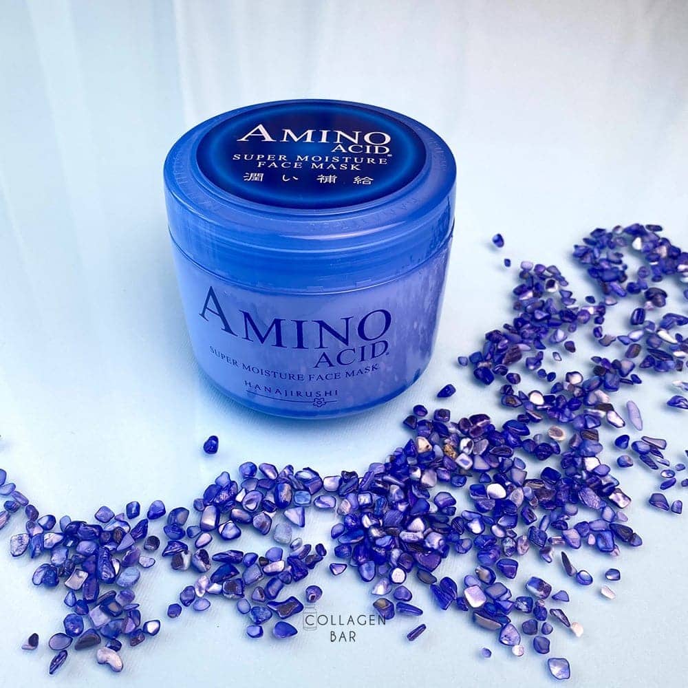 Маска Hanajirushi Amino Acid Super Moisture Mask с мелкими синими декоративными камушками на стекле