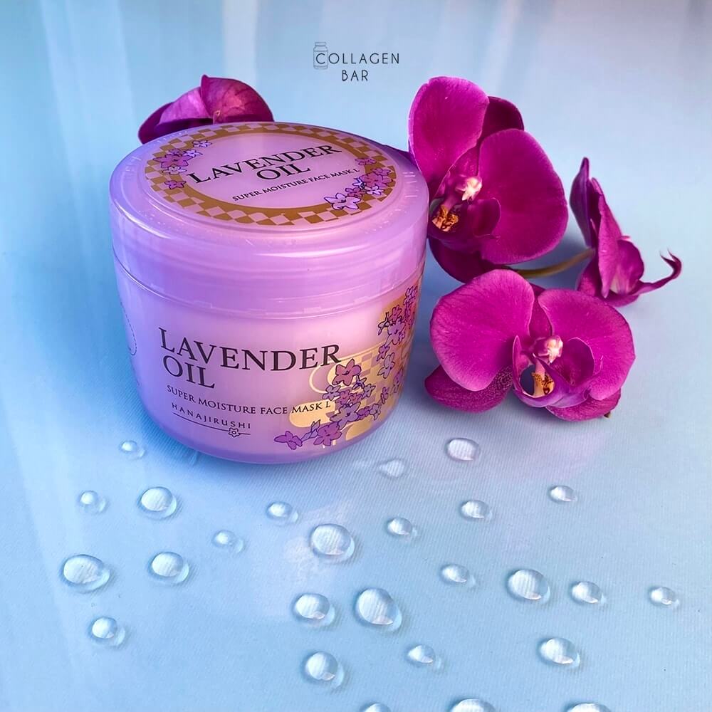 Маска Hanajirushi Lavender Oil Super Moisture Mask з фіолетовими квітками і великими краплями води на склі