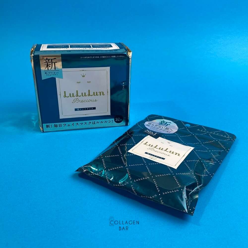 Две упаковки масок LuLuLun Precious GREEN на 32 и на 7 штук на синем фоне
