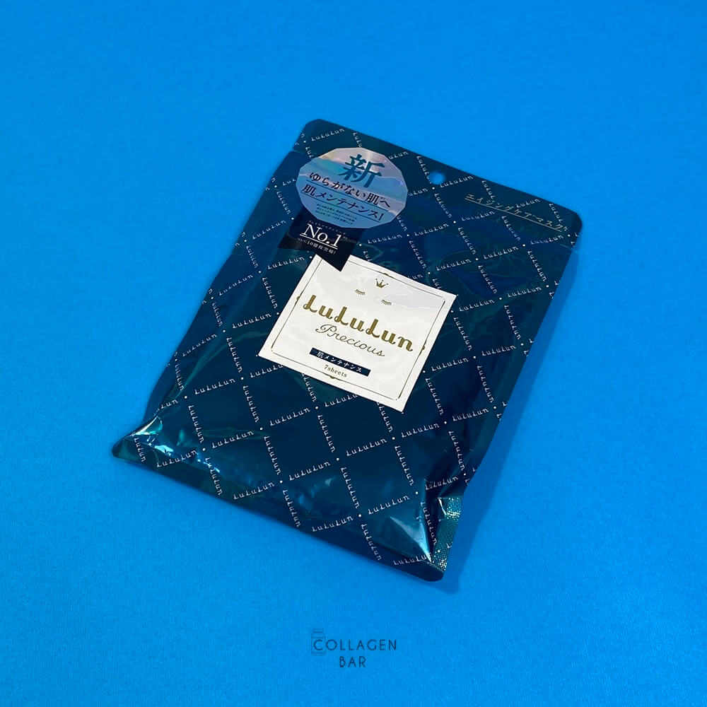 Маска LuLuLun Precious Green в упаковке на 7 штук на синем фоне