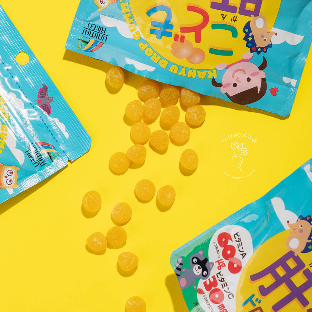 Фрагменти 3-х упаковок A, B, C, D Unimat Riken Kids та мармеладки з упаковки поруч