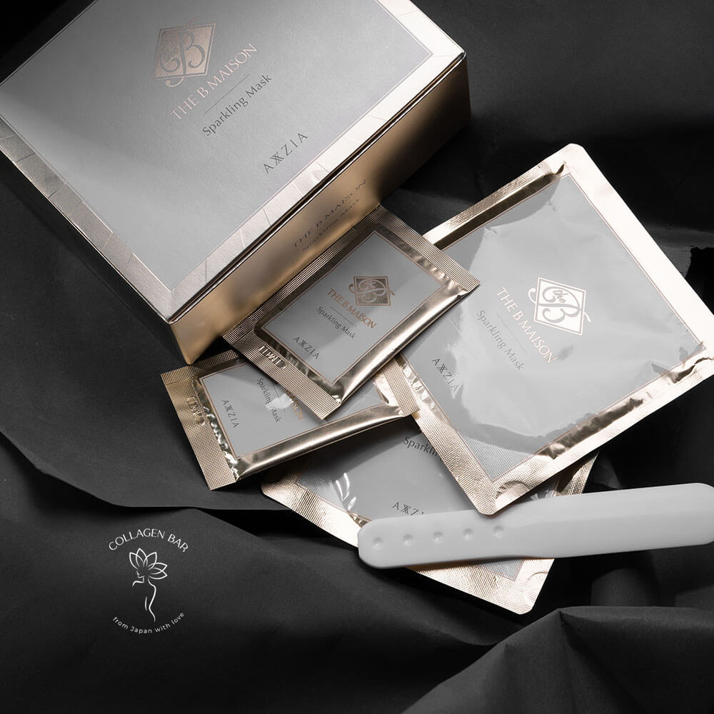Дві фази карбоксі масок AXXZIA The B Maison Sparkling Mask в пакетиках поруч з коробкою