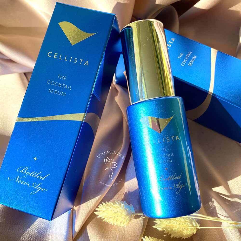 флакон і дві коробки сироватки CELLISTA The Coctail Serum на коричневій тканині