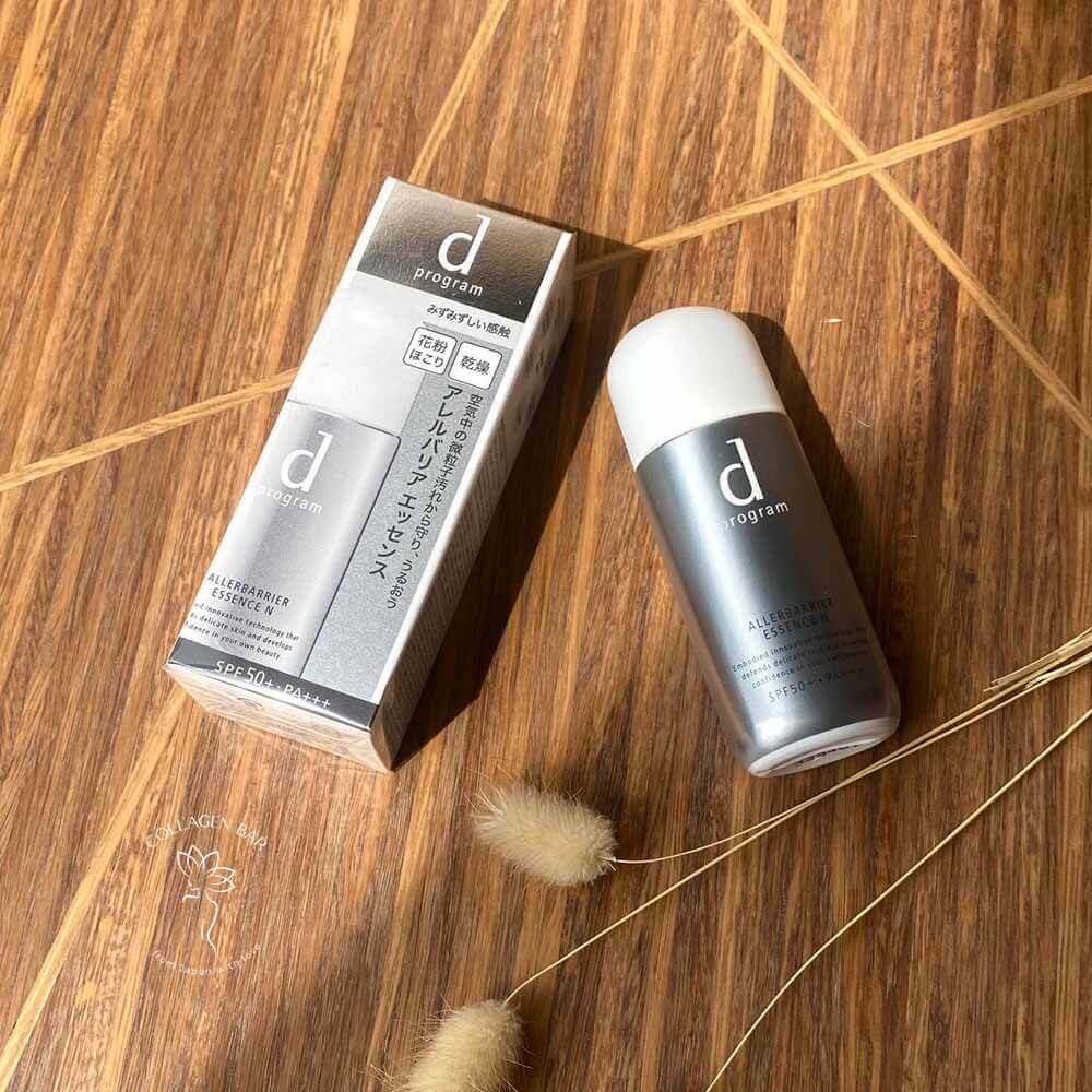 Коробка і тюбик SHISEIDO d Program Allergy Barrier Essence N з колосками на дерев'яній поверхні