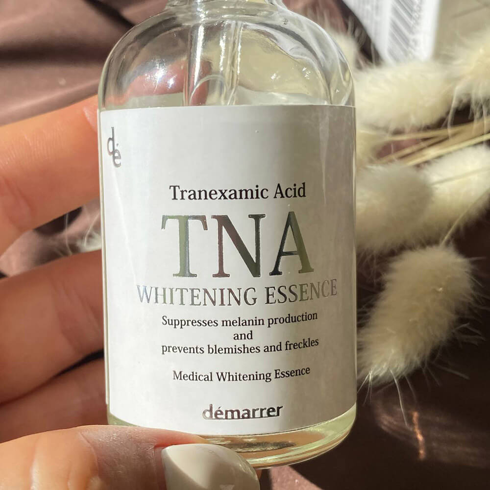 Этикетка на флаконе DEMARRER TNA Whitening Essence крупным планом